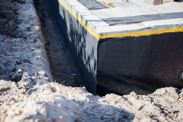 Professional Waterproofing technician working in Ridgeville, IN